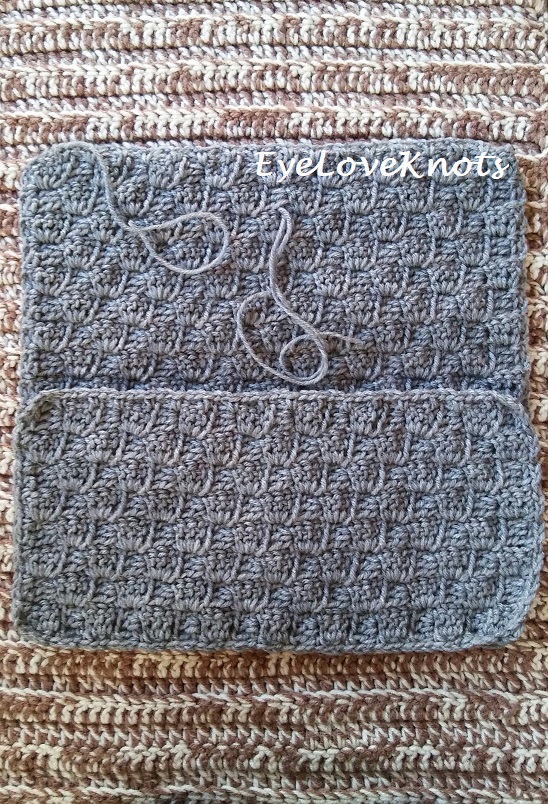 Second step of how to assemble a crochet pillow
