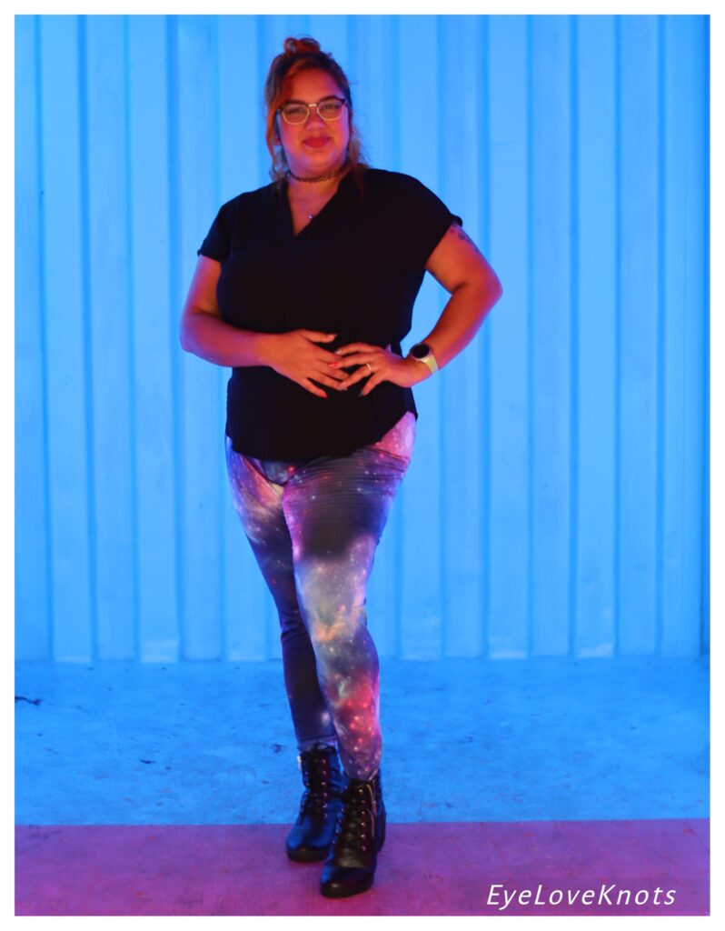 Girl in black leggings, black blouse and white sneakers Stock Photo - Alamy