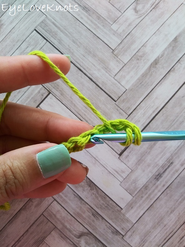Quote from creator's blog post: A pretty braided cable dishcloth