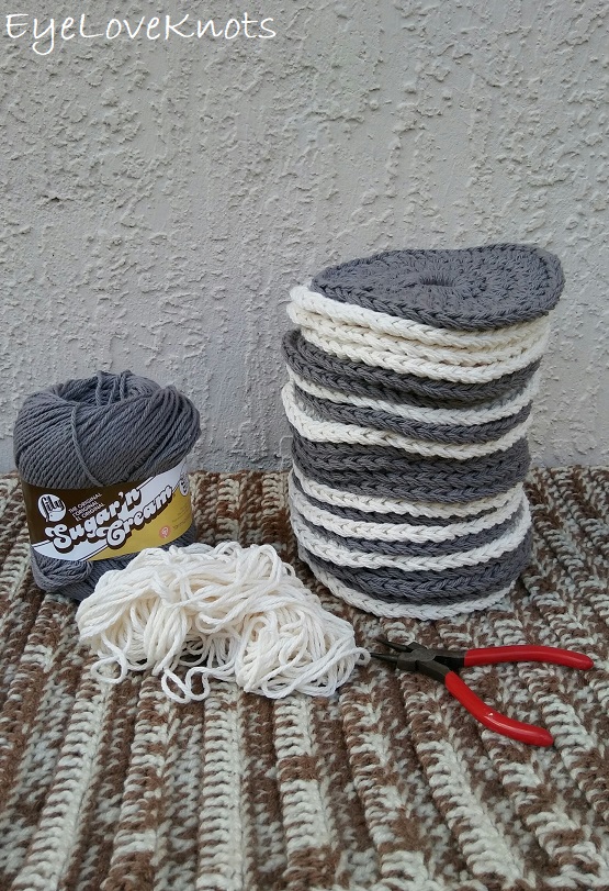 Pile of gray and cream circle motifs