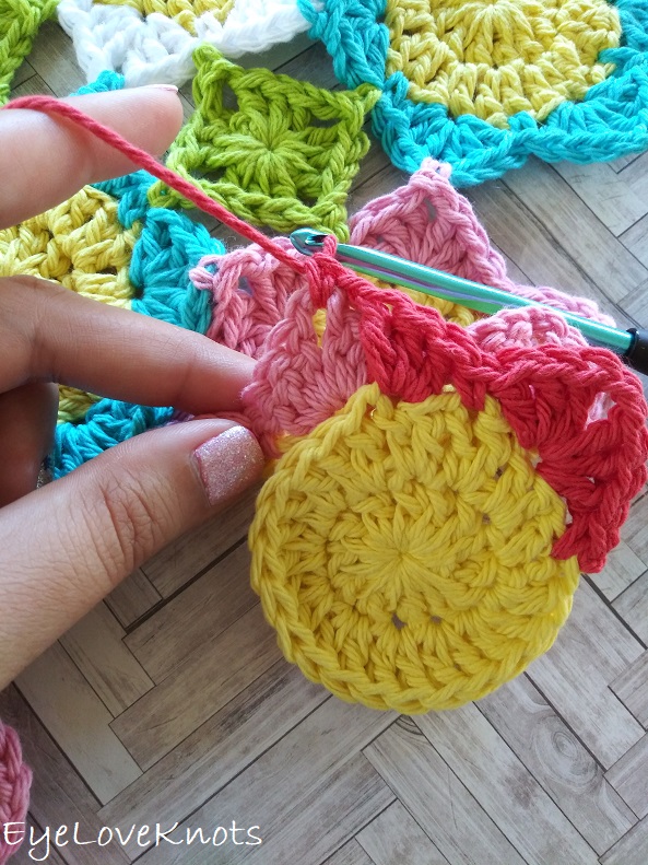 single crochet from behind into previous flower EyeLoveKnots