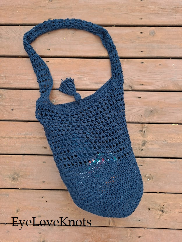 Crocheted Bucket Bag Beauty laying flat on deck.