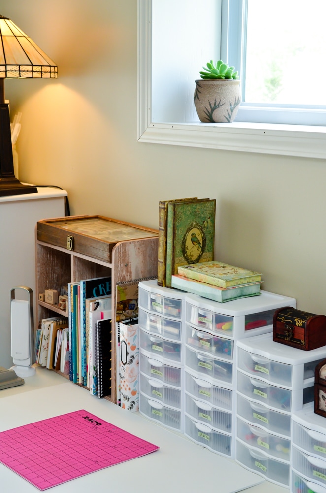 plastic storage bins of organized markers